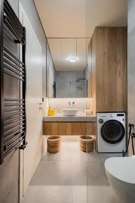 a bathroom with a sink and a washing machine at Mandarin One Bedroom Apartment Varkiza in Vari