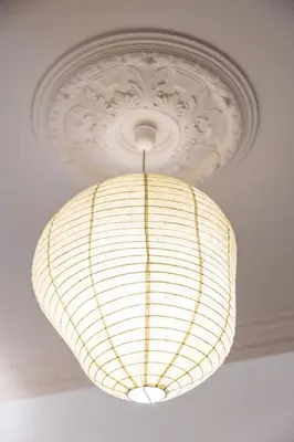 a ceiling light with a white ceiling at Ernesto Apartment in Athens