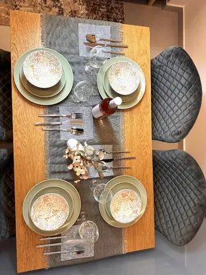 a table with plates of food and forks and glasses at City Center Acropolis area Maisonette Modern House in Athens