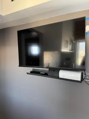 a mirror hanging on a wall in a room at Panormou Cityview Loft in Athens