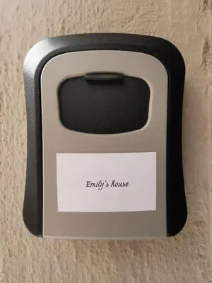 a lightswitch with a sign that reads entry is house at Emily's house in Athens