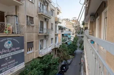 a view of an alley between two buildings at Athens Center 2 BDR Family Apartment at Zografou ! in Athens