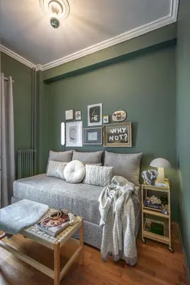 a living room with a couch and a table at Bonjour Athens in Athens