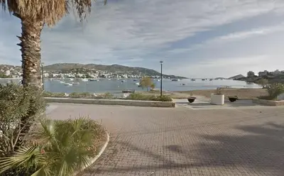 a view of a harbor with boats in the water at Home by the Sea in Porto Rafti in Porto Rafti