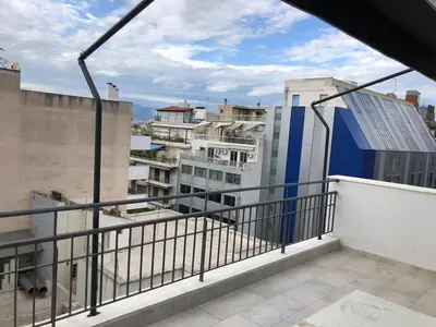 a balcony with a view of some buildings at Luxurious apartment with big balconyBEST location in Athens