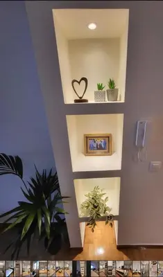 a room with plants and a heart on the wall at 2 bd renovated flat at acropolis in Athens