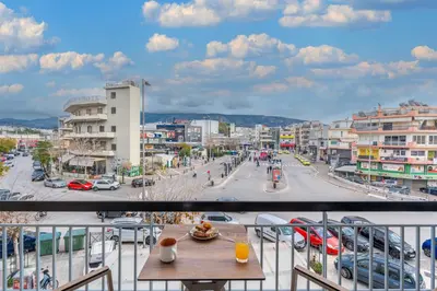 a view of a city from a balcony at Rizes Suites Metro Dafni in Athens