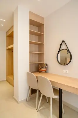 a dressing room with a table and two chairs at Urban Athens Gem in Athens