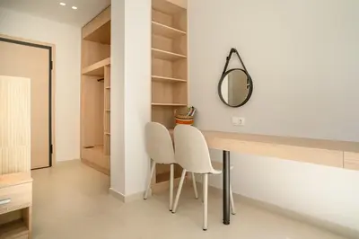 a dressing room with two chairs and a mirror at Urban Athens Gem in Athens