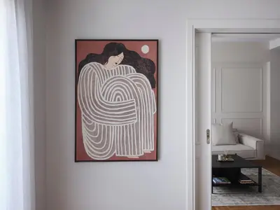 a painting of a woman on a wall in a living room at Sleek & Stylish 2 bd apt with Parthenon view in Athens