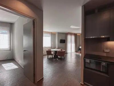 a room with a table and a dining room at Thissio Acropolis Historic Flat 1 in Athens