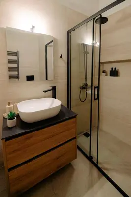 a bathroom with a sink and a shower at Acanthus Art Deco Retreat 250 from Metro & Archaeology Museum in Athens