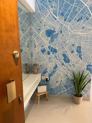 a mural of a paris city on a wall at Acropolis Central Living in Athens