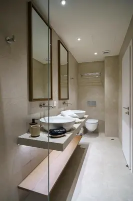 a bathroom with two sinks and two toilets at BAMBOO Athens Villa in Athens