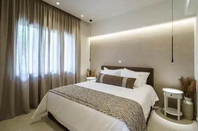 a bedroom with a bed and a large window at BAMBOO Athens Villa in Athens