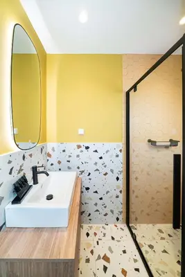 a bathroom with a sink and a mirror at Casa Arcobaleno Athens in Athens