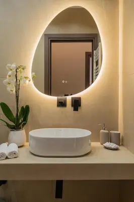 a bathroom with a white sink and a mirror at Elegant Suite Syntagma 2BR 2BA in Athens