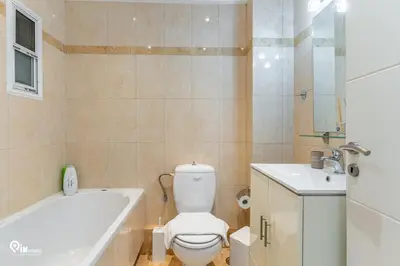 a bathroom with a toilet and a tub and a sink at Suite Escape - Cozy House in Egaleo-Athens in Athens