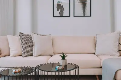 a living room with a couch and a table at Elegant Penthouse 2 BRs - Large Veranda with View in Athens