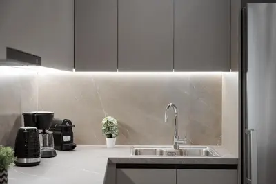 a kitchen with a sink and a counter at Athens Luxury Ethereal Stay in Athens