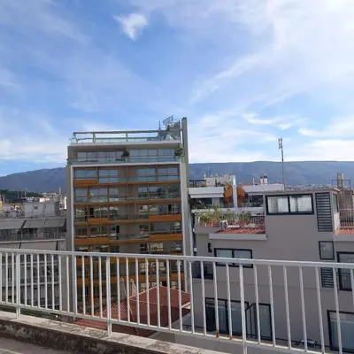 a view from the balcony of a building at Super central loft - Acropolis metro, museum in Athens