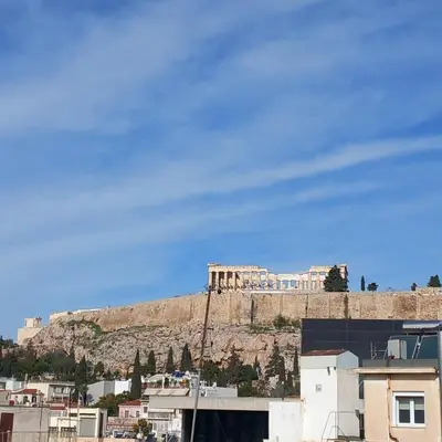 a view of the acropolis from the city of athens at Super central loft - Acropolis metro, museum in Athens