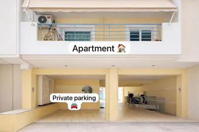 a building with a sign that reads apartment and private parking at Elegant Suite - Neo Psychiko in Athens