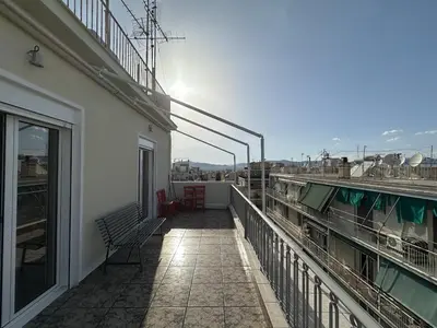 a balcony with a view of a building at 6th Floor Skyline Suite with Spectacular View in Athens