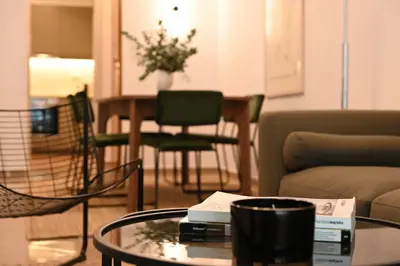 a living room with a coffee table and a couch at Brand new 3bedroom athenian flat in Koukaki in Athens