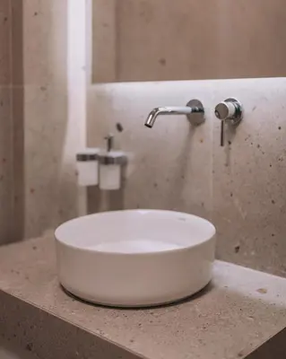 a white sink on a counter in a bathroom at Elegant Intimate Studio in Piraeus near Pasalimani in Piraeus