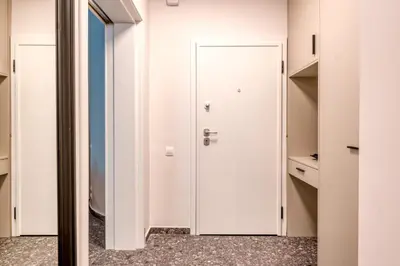 a door in a room with a closet at Elegant Intimate Studio in Piraeus near Pasalimani in Piraeus