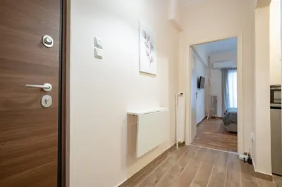 a door leading into a hallway with a room at Gyzi Center Studio by MPS in Athens