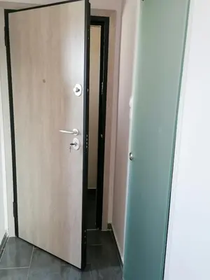 a door in a room with a corridor at Penthouse! Best views Lycabetous & Parthenon ! EXARCHEIA in Athens