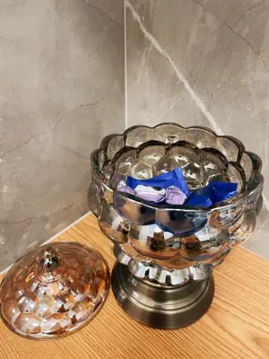 a glass bowl sitting on top of a table at Bluebay Cozy Aparment 8 in Athens