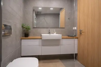 a bathroom with a sink and a toilet at Attiki Square & Metro Modern 2-Bedroom Apt by MPS in Athens