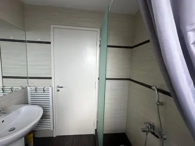 a bathroom with a shower and a toilet and a sink at Koukaki - Athenian Glow in Athens
