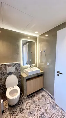 a bathroom with a toilet and a sink at Queen Mary Psyri in Athens