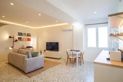 a living room with a couch and a table at Queen Mary Psyri in Athens