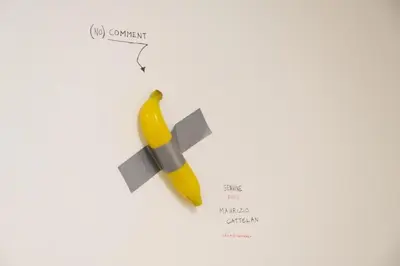 a banana taped to a wall with a dagger at 3Bed Loft 500m from Monastiraki Sq in Athens
