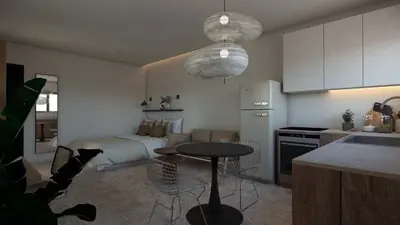 a kitchen with a bed and a table in a room at Pixie Studio Athens in Athens