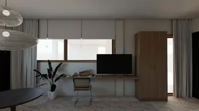 a living room with a television and a table at Pixie Studio Athens in Athens