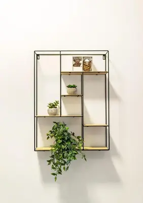 a black shelf with potted plants on a wall at Cozy Pangrati Hideaway in Athens
