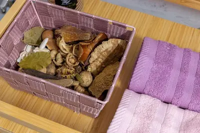 a pink container filled with different types of minerals at Stylish Modern Athens apt in Athens