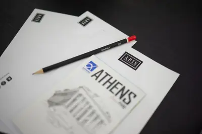 a pencil sitting on top of a piece of paper at ARIS Kallithea- Big & Bright 3 Bedroom Apartment in Athens