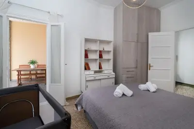 a bedroom with a bed with two white pillows on it at Sunrise Apartment By Athens Airport in Spáta