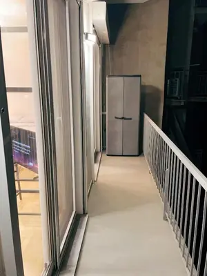 a hallway with a door in a building at Bluebay Cozy apartment 18 in Athens