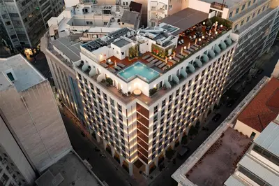 an overhead view of a large building with a pool at Adia Aluma Athens, Curio Collection By Hilton in Athens