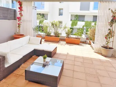a living room with a couch and a coffee table at Adelos II Glow Villa 5BR 360m -Elevator-Rooftop in Athens