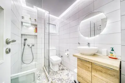 a bathroom with a shower toilet and a sink at So36 Filoxenia Place Like Home Kolonaki- next to metro and center in Athens