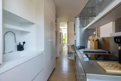 a kitchen with a sink and a counter top at Culture and Luxury 2bed Flat with Acropolis Views in Athens